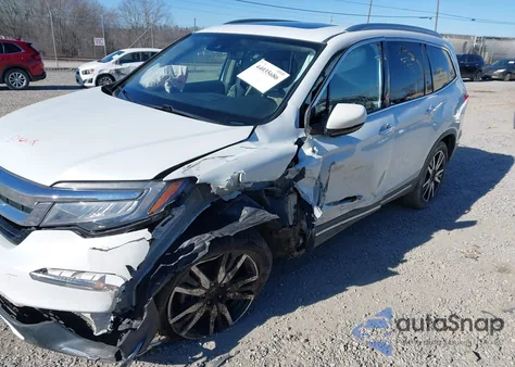 2021 Honda Pilot Awd Touring 7 Passenger z USA, uszkodzony, nr VIN 5FNYF6H65MB091805